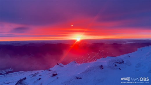 A vibrant sunrise this morning (February 25) may be the only glimpse of sun at the higher terrain today. Overcast skies, snow, and summit fog are expected to persist through much of the day. For full details, visit mountwashington.org/forecast | Mount Washington Observatory