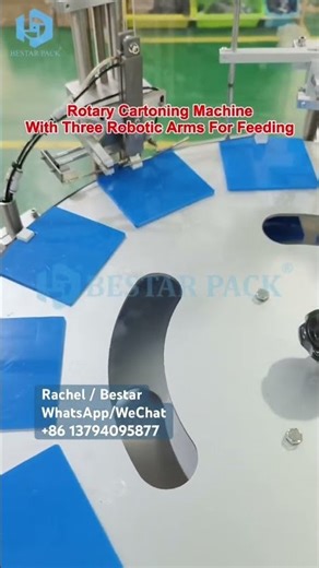 Rotary cartoning machine with three robotic arms for feeding