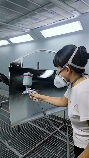 Changing car door paint color using spray method for smooth finish