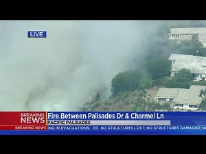 Water-Dropping Helicopters Conducting An Aerial Assault On Pacific Palisades Brush Fire