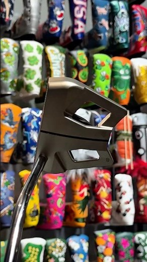 Scotty Cameron 9R and Fastback OC look even better against the limited edition putter cover wall