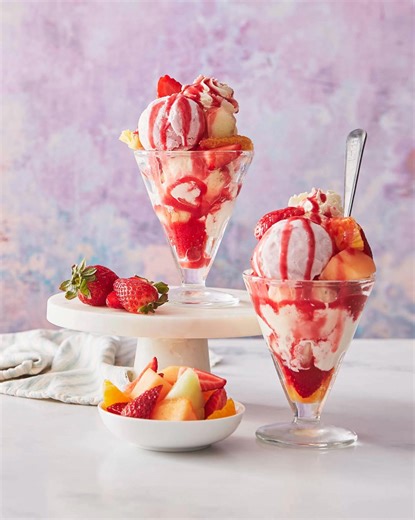 Summer Fruits Sundae recipe 🍓 Our deliciously decadent treat is one to try this Bank Holiday, why not create a sundae station with all your favourite toppings? 🤩 Serves 2 Ingredients: 1 pack Booths sharing fruit salad 2 scoops Booths strawberry ice cream 2 scoops Booths vanilla and clotted cream ice cream For The Orange Cream 50ml double cream 1 tbsp icing sugar Zest of 1 orange For The Strawberry Sauce 100g strawberries 1/2 lemon (juice only) 1 tbsp icing sugar Method: 1. For the strawberry s