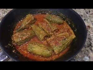A unique way of making Gujarati style Stuffed Bitter gourd (Karela)