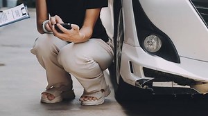 Download senior man and insurance agent claim process after car crash for free