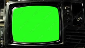 Old Analog Television Turning On - Static Noise and Green Screen Display - Close Up - 4K