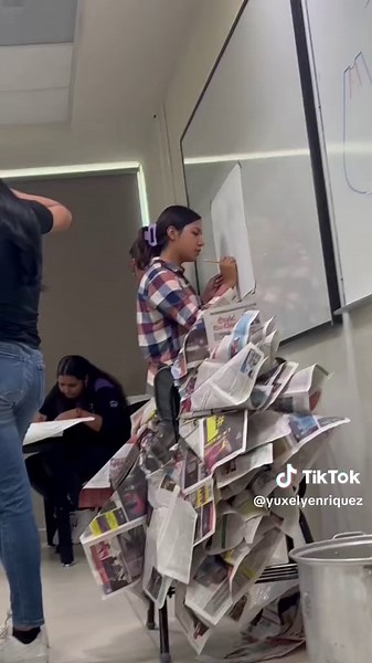 Creative Dress Making from Newspaper Sheets