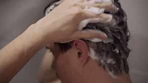 Man Washing His Hair in the Shower | Premium Stock Video Footage