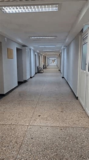 clip-4009878871-empty-hospital-corridor-long-perspective-view-inside