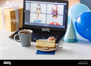 birthday cake and laptop with video call on screen Stock Photo - Alamy