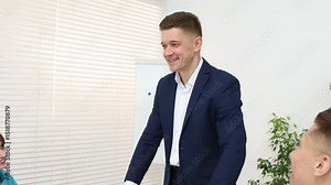 Group of people having meeting during life coaching class indoors. Camera zooming out and in