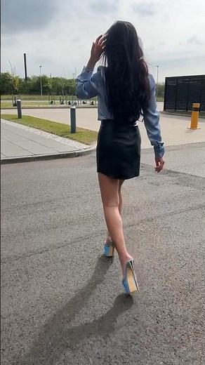 Walk from a juice office in leather mini skirts & mule heels and blue satin ( and big windy 🌬️ )