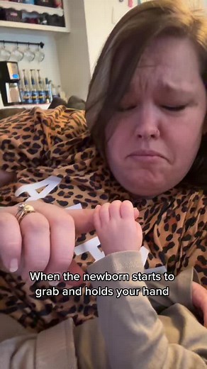 Adorable Moment: Baby's Hand Holding Parent's Hand