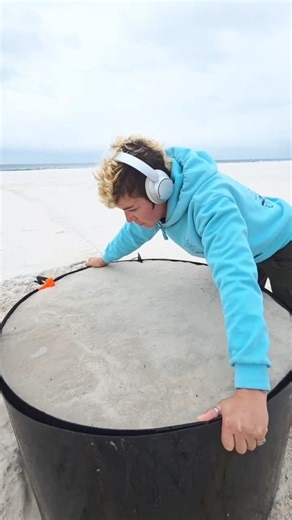 Sand Castle University on Instagram: "What am I listening to? This is what we call the pound up process in sand sculpting. I am using a round form to compact the layers of sand with water. This hard pack method is how I am able to sculpt fine details without it falling apart. #asmr #sandcastle #process #sandasmr #sculpture #gulfshores #alabama"