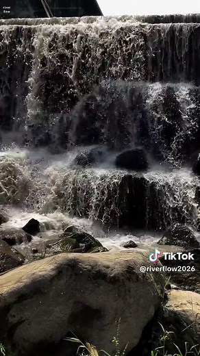 Nature Made by Humans 🌊 A powerful waterfall-like flow, rushing over natural rocks and creating a stunning view. It may look completely natural, but this beautiful water flow was actually created by humans! 💦🌿#Waterfall #NatureLovers #HiddenBeauty #RelaxingNature #TikTokNature