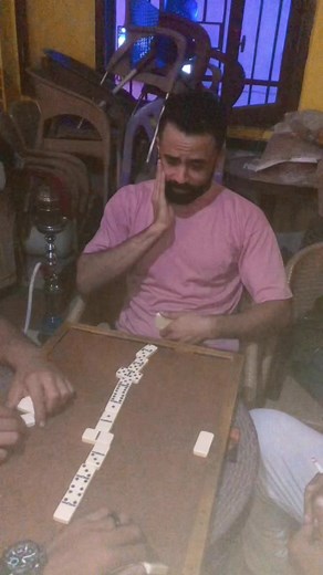 Dominoes Game Fun with Friends in a Cozy Home