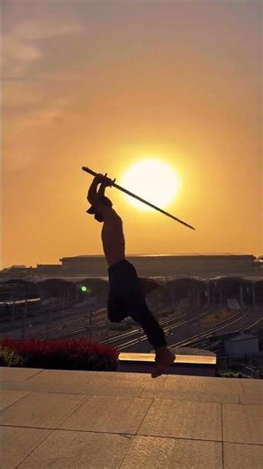 Sword Dance at Twilight: A Master's Two-Handed Artistry Unveiled