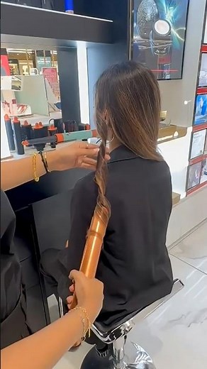 How can You make curls with the Dyson Corrale™ straightener?