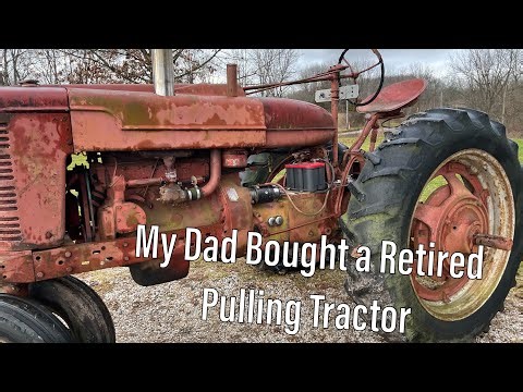Old Farmall Pulling Tractor