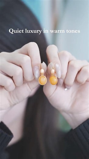 Butterscotch Amber in a soft gold finish, refined for everyday elegance.