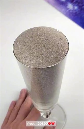 Creative Sand Art with Galaxy-Themed Object