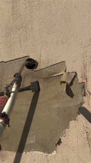 Why is a heat gun used to remove old wall plaster?