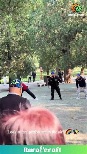 This is NOT Your Average Park Activity! 😱 Watch These Beijing Seniors Throw Multiple Hoops! #skills