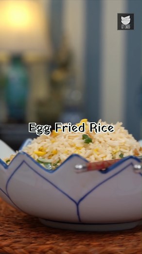 A great way to use up leftover rice, this quick fried rice cooks up with eggs, vegetables and Chinese sauces. Ingredients: Eggs 1 tbsp Oil Salt Black Pepper 1 cup Basmati rice (cooked) Oil 2 tsp Ginger, crushed 2 tsp Garlic, crushed 1 tsp Chilli flakes 2 Spring Onions, whites 2 tsp Soy sauce Salt Spring Onions, green Vinegar Method of preparation: Heat a wok, add oil, eggs, scramble it quickly and season it with a pinch of salt and pepper. Take it out in a bowl and in the same pan, add oil, ging