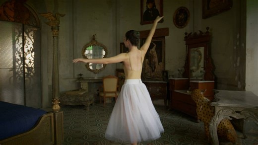 Ballerina spinning in a vintage furniture bedroom  - Free Stock Video