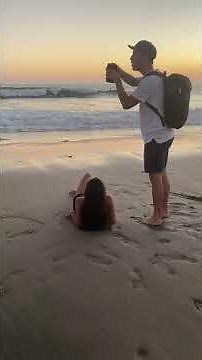 Girl at the beach reacts to stranger taking her photos