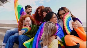 Happy group of gay people having fun celebrating together LGBT pride festival day. LGBTQ community concept