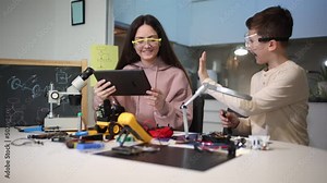 Children making a robot at home. Education in robotic at home.