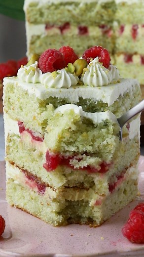 30K views · 384 reactions | This Pistachio Raspberry Cake is made of layers of moist Pistachio cake, with Raspberry Jam and Pistachio Ganache as fillings, topped with Pistachio Buttercream.  Check out this amazing recipe here: https://www.piesandtacos.com/pistachio-raspberry-cake/ | Pies and Tacos | Facebook