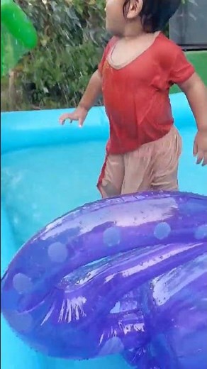 Cute baby dance in pool