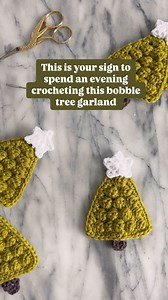 345K views · 21 reactions |  PATTERN INFO  These easy bobble trees are perfect for a garland, ornament or stocking accessory! And yes, you can finish this in one evening! The pattern includes detailed step by step photos plus 2 stitch tutorial videos. Comment “bobble tree” and I’ll send you the link plus a promo code! #crochet #crochetpattern #crochetinspiration #crochetchristmas #crochetgarland #crochetornament | Hookandfibermade | Facebook
