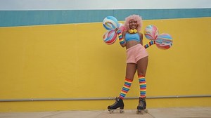 Beautiful woman skating with roller skates and having fun. Professional skater and dancer training in the morning