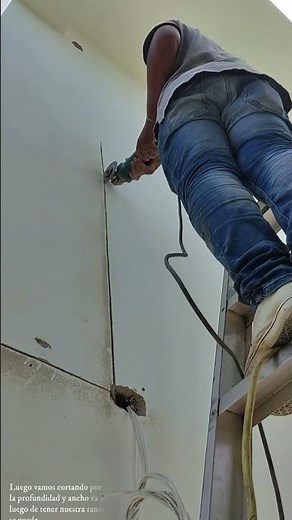 Slotted cable in concrete wall
