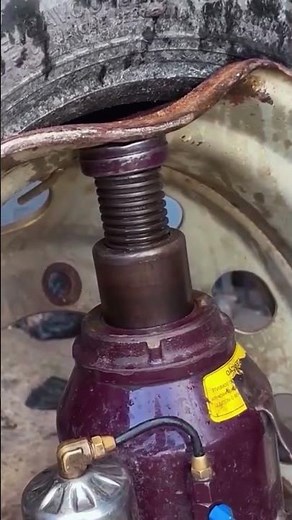 This is how to repair dented car rims using manual tools.