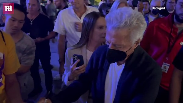 Dustin Hoffman and wife Lisa greet fans outside of Lakers game