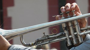 Person playing a trumpet, close up - Free Stock Video