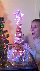 75K views · 524 reactions | Our friend made her famous Candy Cane Tree  Our friend Nicole shows us how to make an amazing candy cane Christmas tree by heating up candy canes so she can bend them around a cone. Then she dresses it with star mints, LED lights, and even molds a star mint star with a cookie cutter. Great last minute idea for holiday decorating for parties and gatherings. #christmasdecor #christmascrafts #holidaydecorideas #candycane #christmas2025 | The Tus House | Facebook