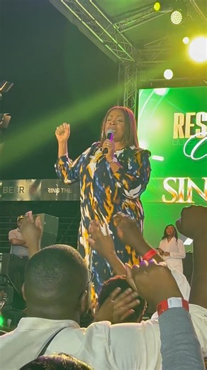Sinach delivers a powerful performance at the packed Hage Geingob Stadium for the Project Never Walk Alone Restoration Concert. | OneAfrica