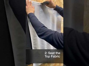 Installing a stretched fabric panel