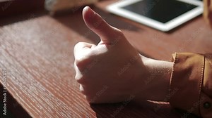 Thumbs up. Slow motion video