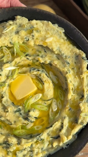 Our spin on Irish Colcannon is a cozy upgrade to mashed potatoes, with sautéed leeks, tender kale, and a cheesy, creamy finish. | Crowded Kitchen
