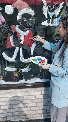 The podiatrist is transforming into Santa Claus upon his window 🪟 as his entire staff and family develop upon the ornaments in the tree. I can personalize any window and tailor it to your vision because your window deserves to stand out this holiday winter season. #artbydebcamp | ART by Deborah Camp