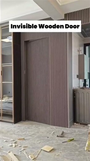 Hidden door using WPC Fluted Panel #hiddendoors #doors #interiordesign #niteshdesignstory