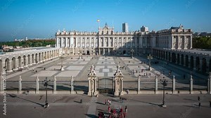 Madrid, Spain, time lapse view of historic landmark Royal Palace of Madrid by day during summer.