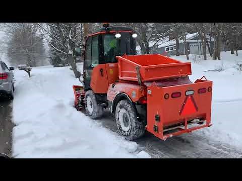 Holder C70 V Snow Plow in Action - Municipal Sidewalk Tractor