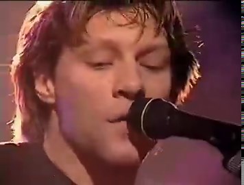 Bon Jovi covering "Mrs Robinson" by Simon and Garfunkel in London, 1996.Beautiful version. The harmony between Jon and Richie's voices is magical.