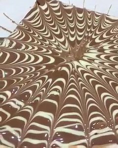 8 comments | It's choc art! Melted milk and white Belgian chocolate poured over made to order crepes#chocartcrepes | Tella Balls Dessert Bar | Facebook